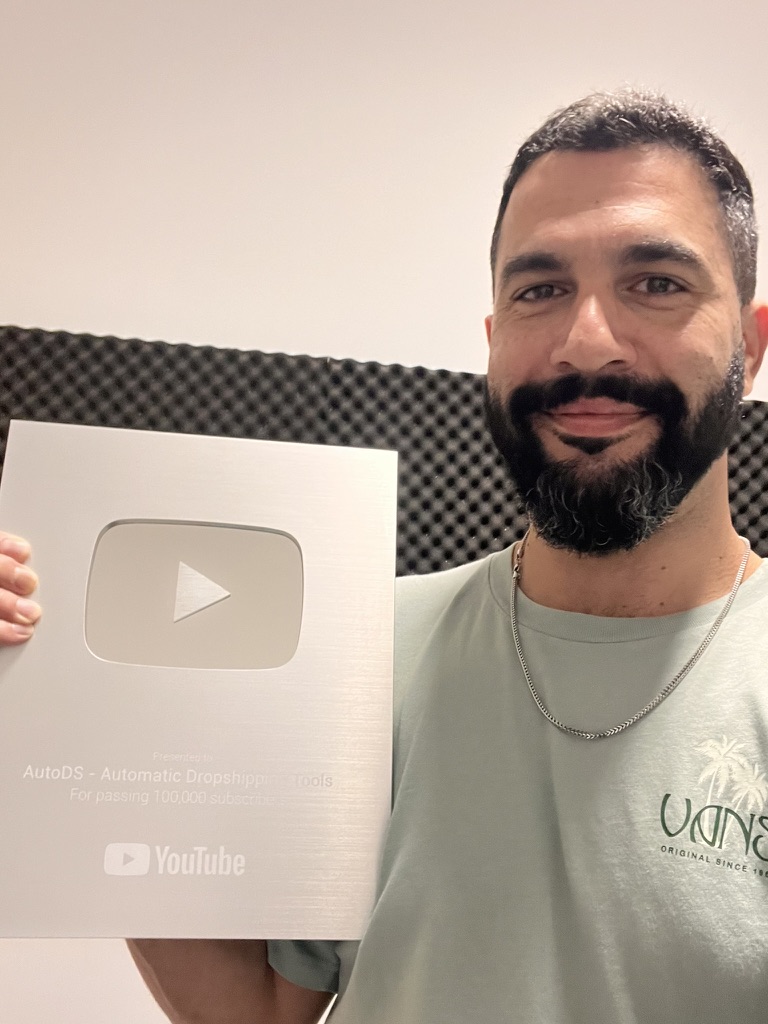 Liran Zablo holding the YouTube Silver Play Button award
